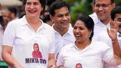 ప్రతిపక్ష ఎంపీల టీ షర్టులపై మింటా దేవి ఫొటో.. ఇంతకు ఎవరీమె..