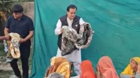 ముస్లిం మ‌హిళ‌ల‌కు దుప్ప‌ట్ల పంపిణీపై వివాదం