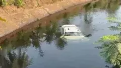 కాలువలోకి దూసుకెళ్లిన కారు..దంపతుల మృతి